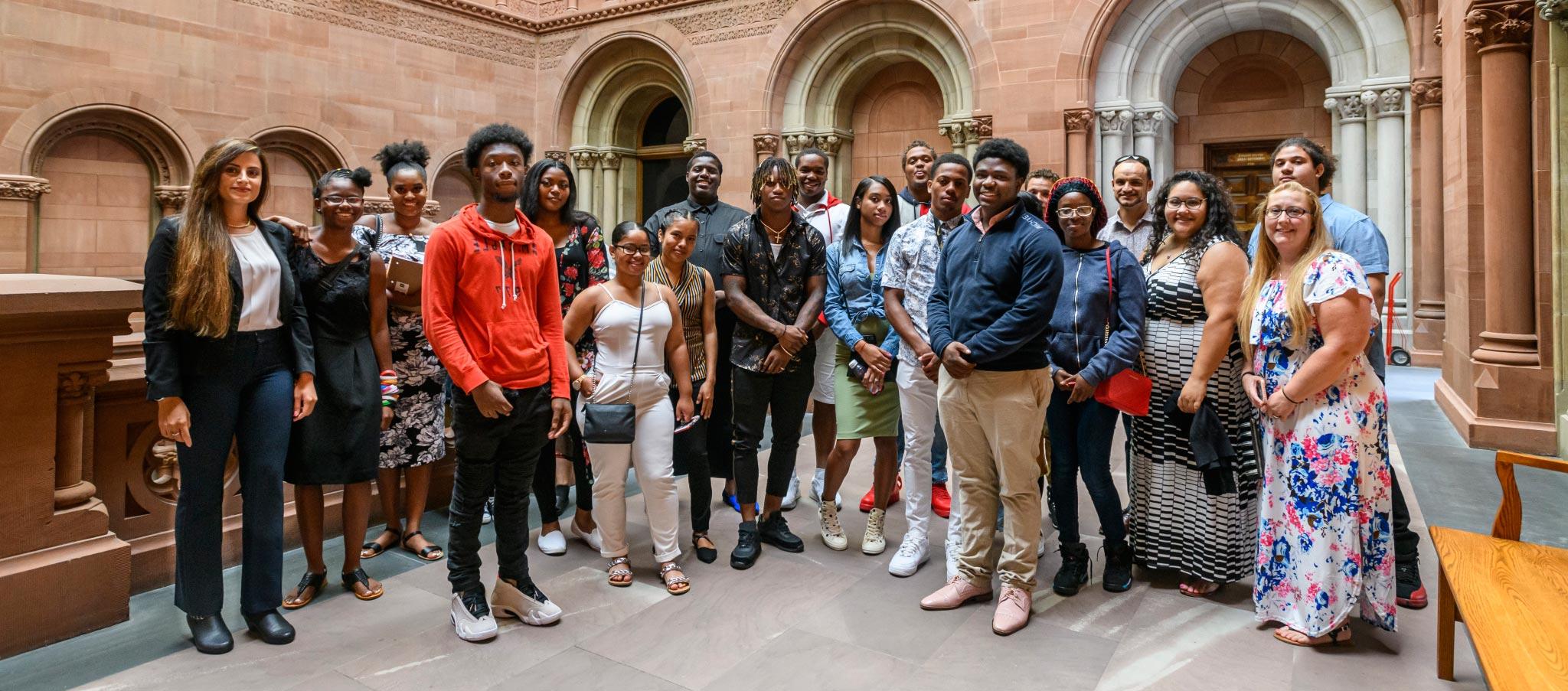 EOP students pose for a picture at the NYS Senate Chamber